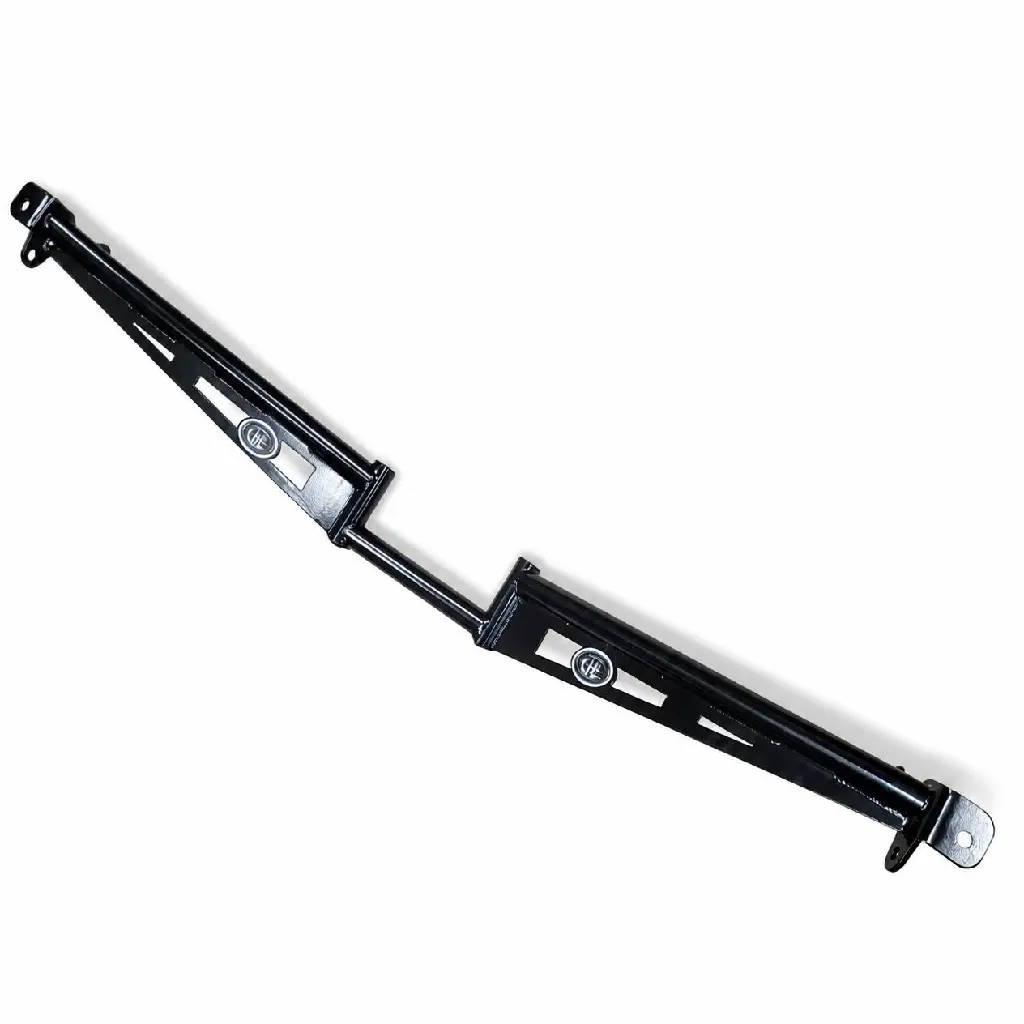Keep the product completely identical to the original image, including the diagonal orientation, long black body, center joint, silver end pieces, silver hardware, brackets, holes, labels, logos, proportions, finish, and all surface details. Only rep.webp