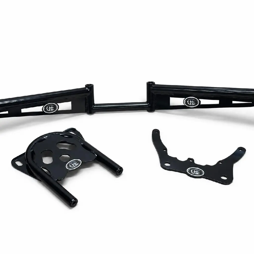 Keep the long horizontal black assembly and both separate loose black components exactly as shown, including the original left and right edge crops, arrangement, perspective, proportions, logos, lettering, mounting holes, cutouts, tubular arms, gloss.webp